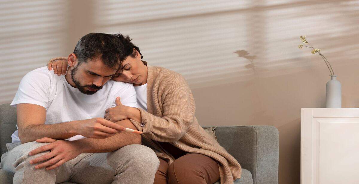 Couple grieving about pregnancy loss