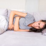 New mom experiencing postpartum gas and bloating